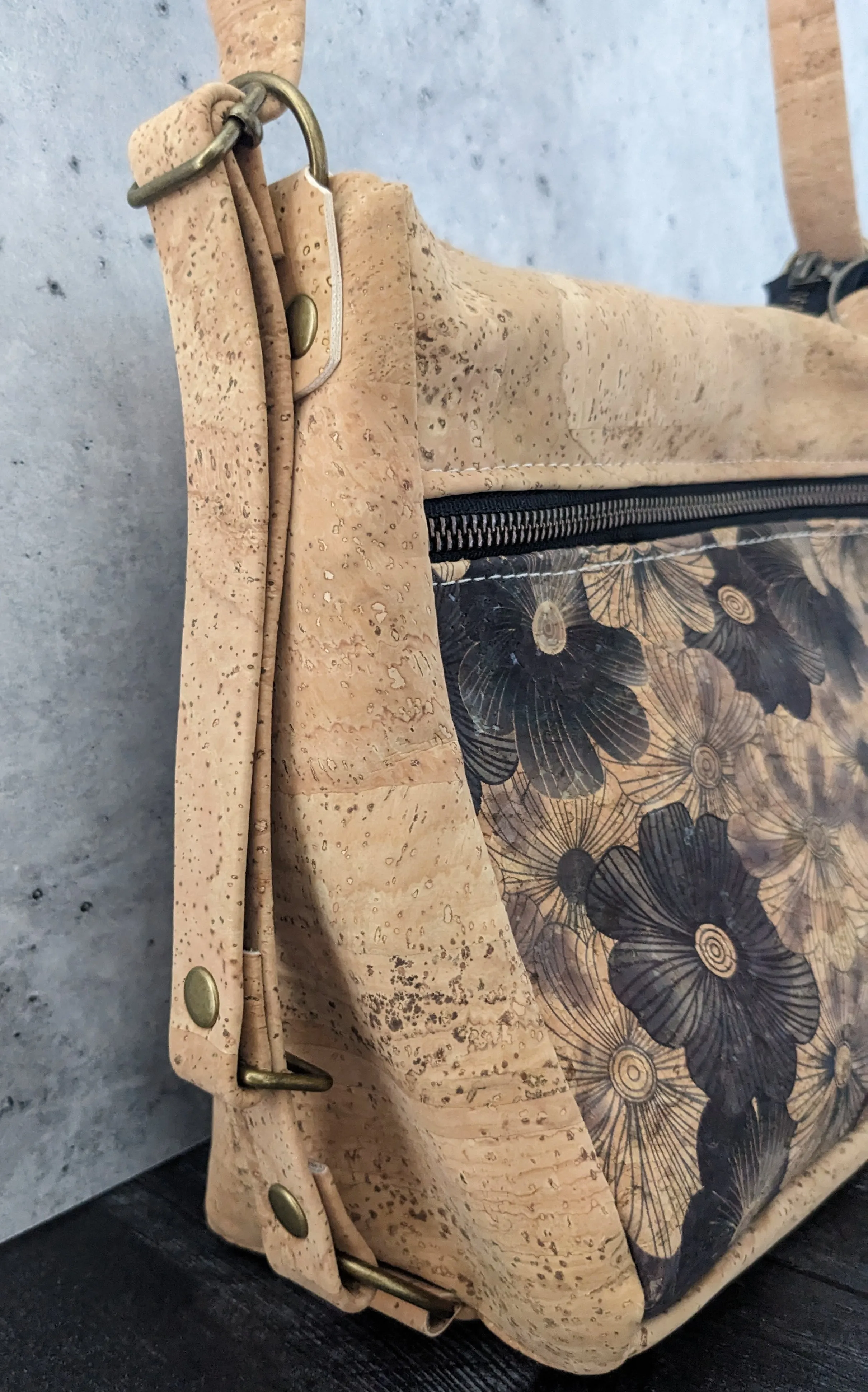 Small Zip Top Crossbody Backpack in Black Flower Cork