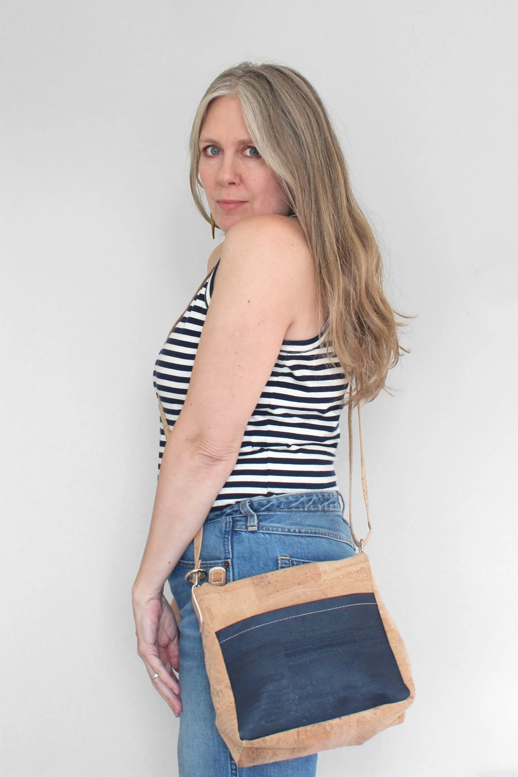 Small Zip Top Crossbody Backpack in Black Flower Cork