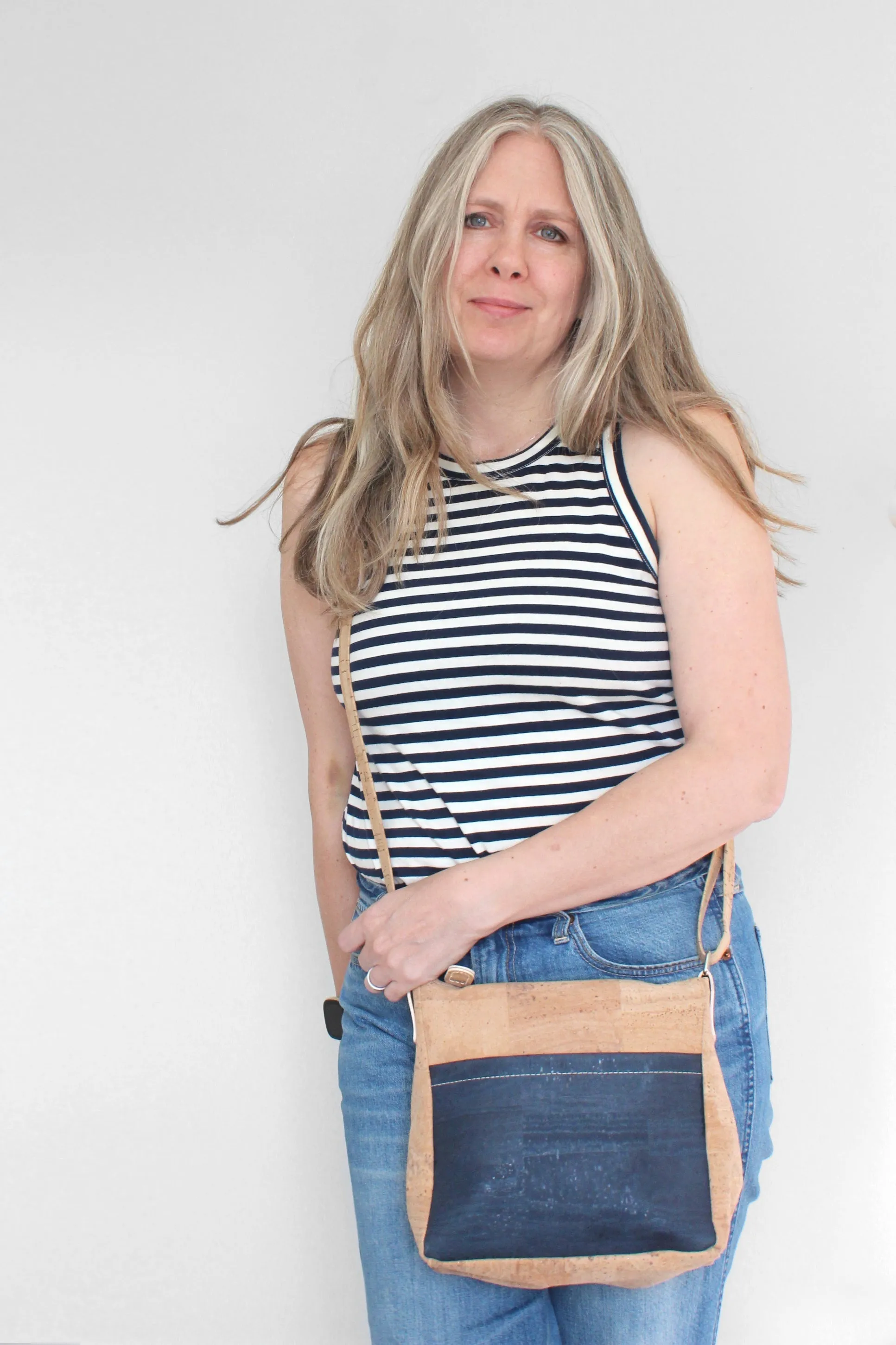Small Zip Top Crossbody Backpack in Black Flower Cork